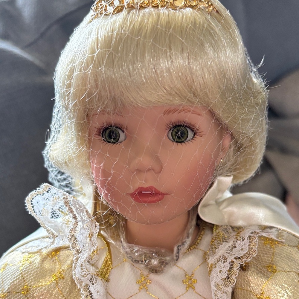 Porcelain Blonde-Headed Collectible Doll with Gold Accents
